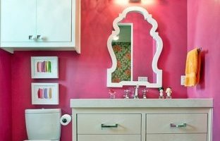 Fabulous mirror and fascinating color make this an ideal bathroom space for most girls!