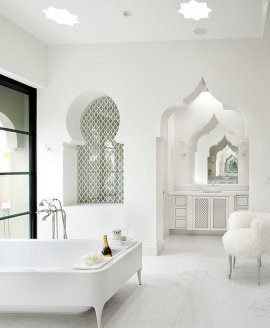 Luxurious contemporary bath uses the Moroccan architectural elements without bright colors and patterns Modern Moroccan Inspired Bathrooms That Promise Exotic Indulgence