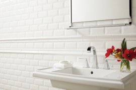 Photo features Profiles 3 x 6 Bevel Tile and 2 x 6 Chair Rail in Ice White.