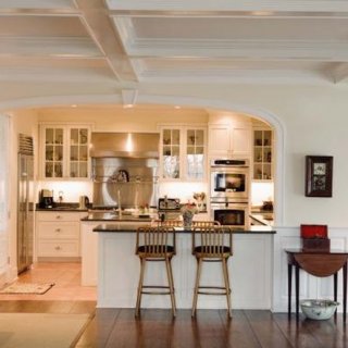 U-shaped kitchens often feel contained, which helps give them their own style.